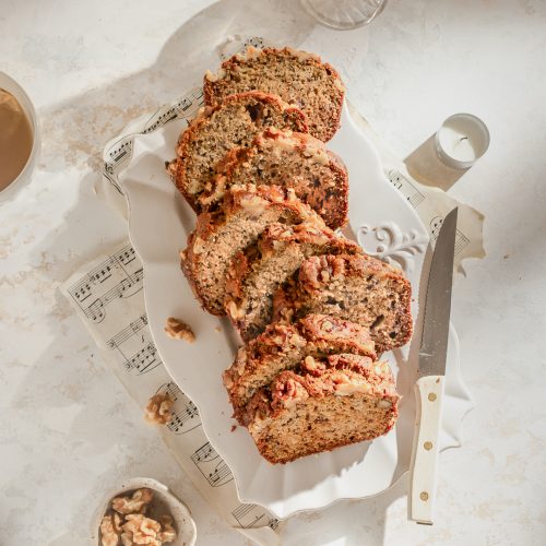 deliciously moist banana bread with walnuts sliced