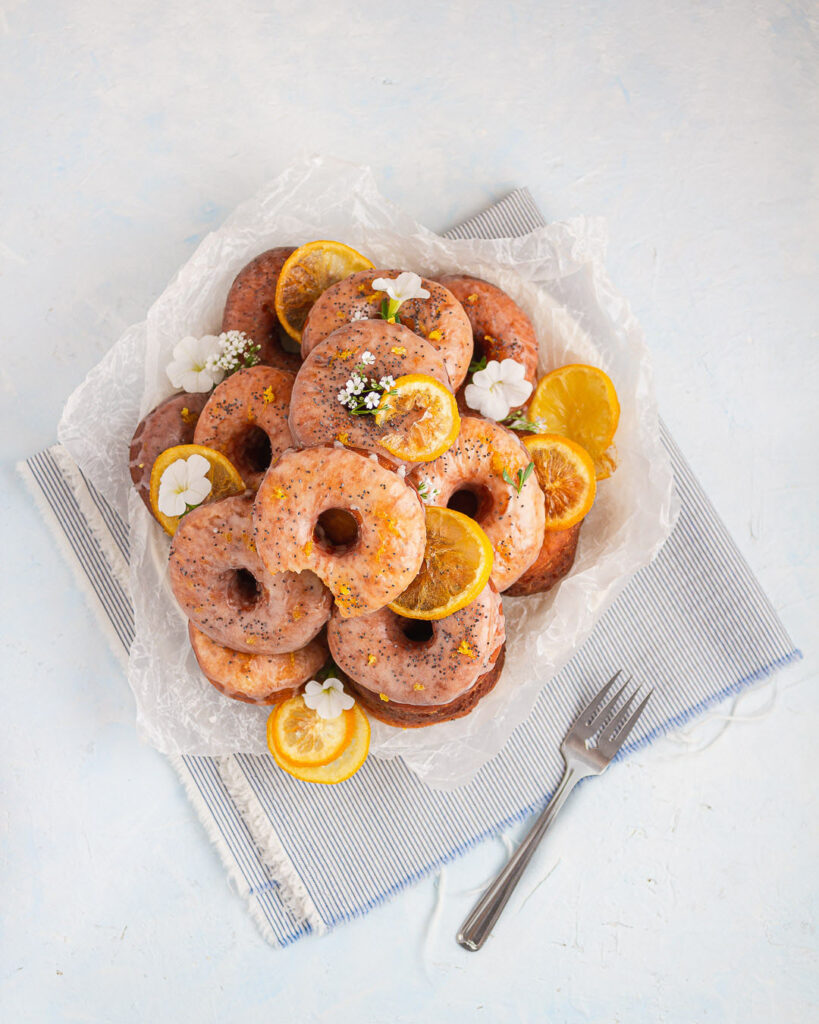 A stack of lemon poppy seed donuts