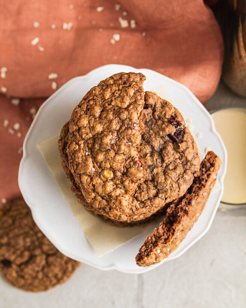 A stack of crispy oatmeal date cookies