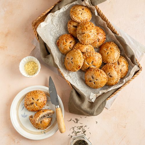 savory hand pies in a basket.