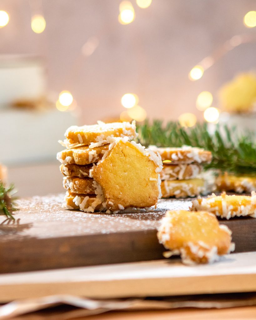 star cookies stacked in front of a lit background