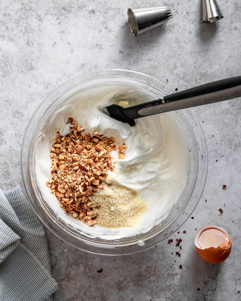 folding in nuts into Hazelnut Almond Dacquoise