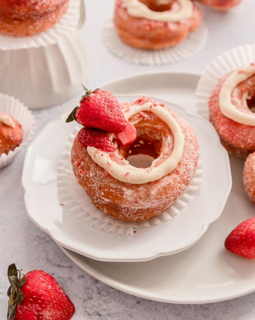 a close look at a strawberry vanilla bean cronut