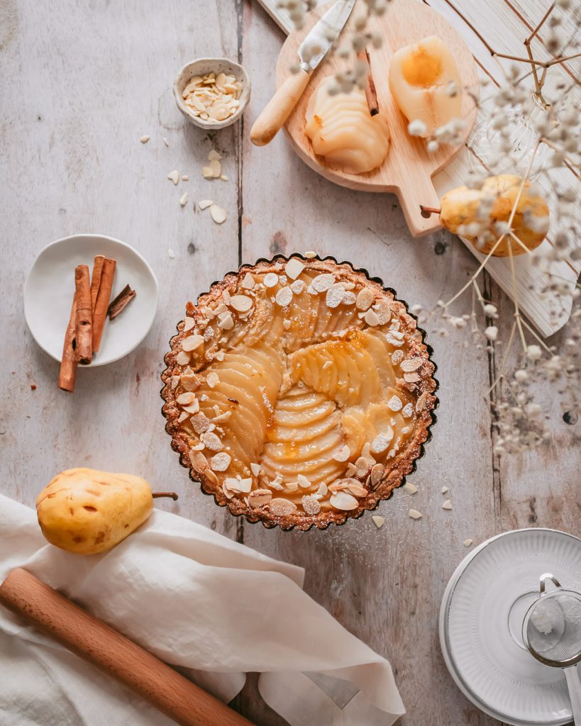 pear frangipane tart being served